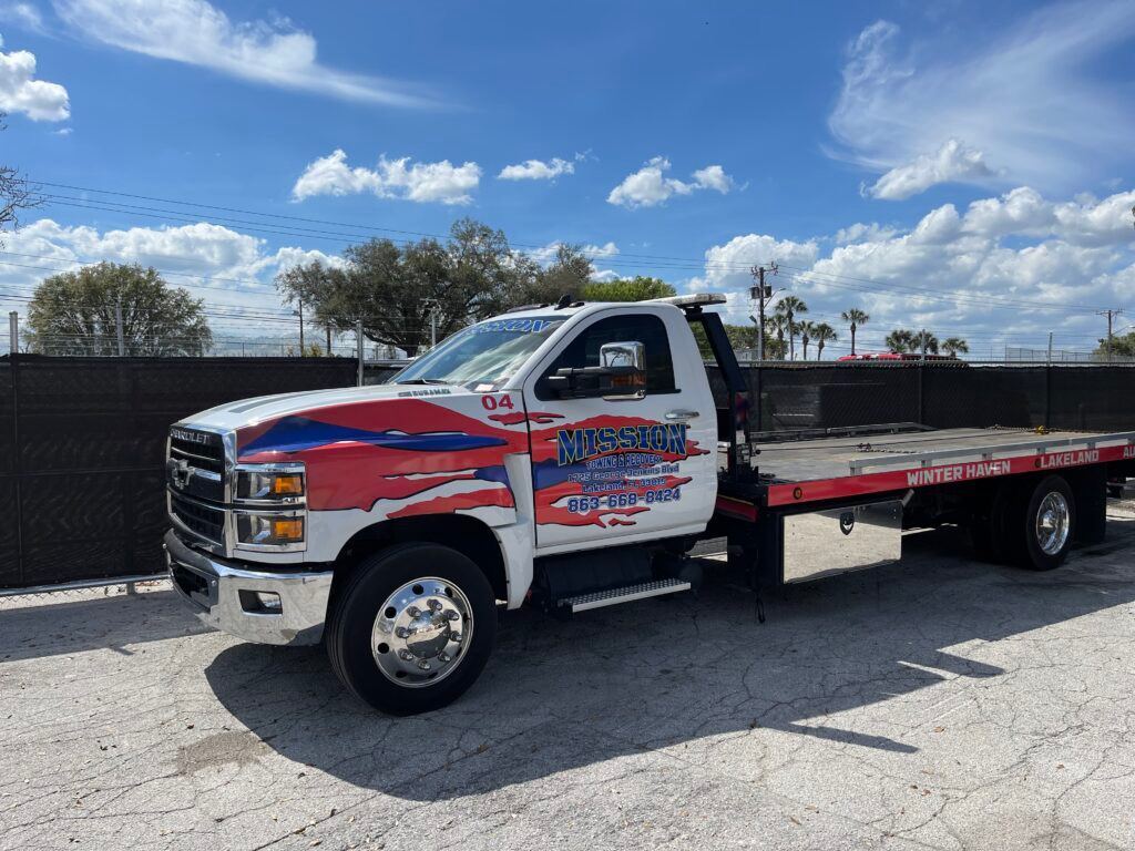 Mission Towing & Recovery - flatbed tow truck - Home Page Splash Image